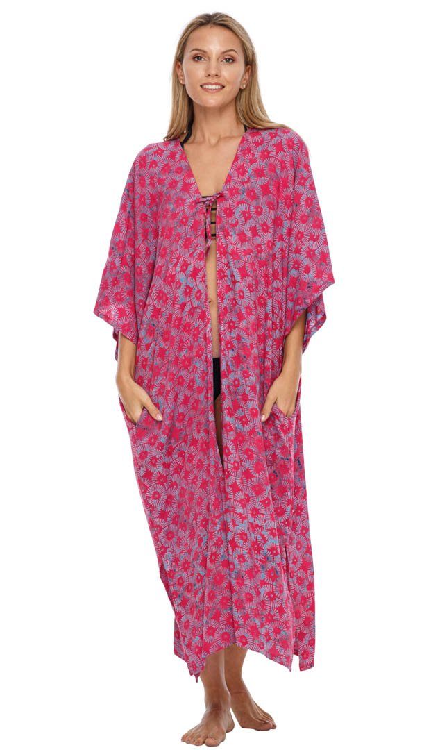 Woman wears a Fuchsia  LoveShuShi Batik Kimono with String Closure. Front view showing pockets