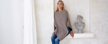 Discover Fall Chic: Cozette Cable Knit Poncho Pullover with Boat Neckline